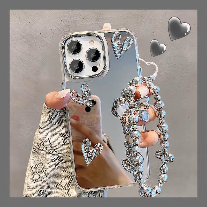 Smartphonehoesje met spiegel aan de binnenzijde en hartdecoratie